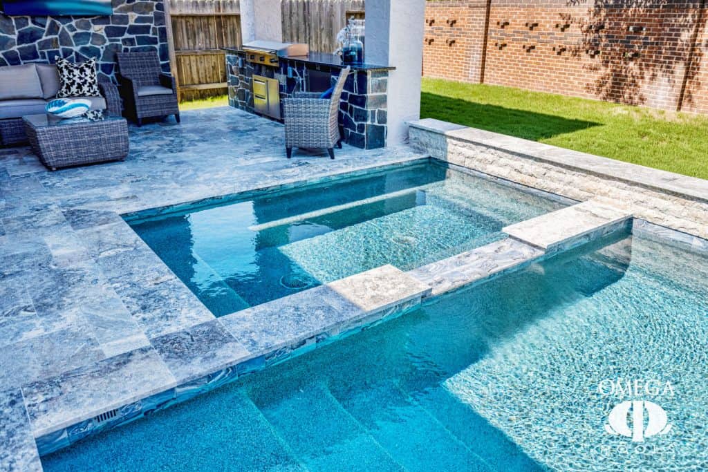 Custom backyard pool by Pool Design Companies Near Me Katy, TX at Omega Pools